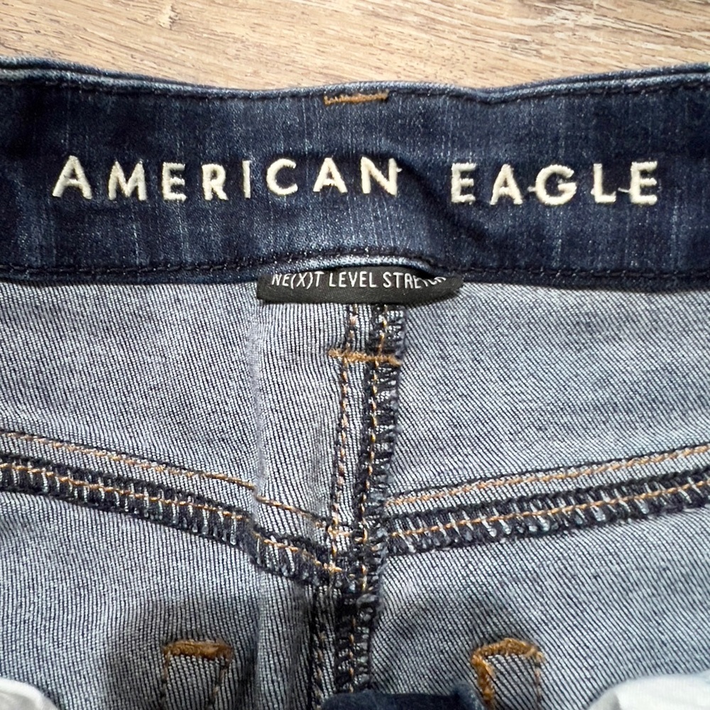 American Eagle Hi-Rise Next Level Stretch Distressed Shorties size 2 Dark Wash - Picture 3 of 5